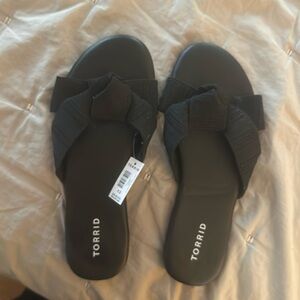 Slip on black sandals from Torrid, size 9.5 wide width